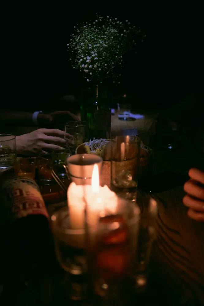 Candlelit table with baby's breath flowers
