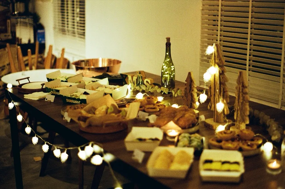 Holiday party table with fairy lights