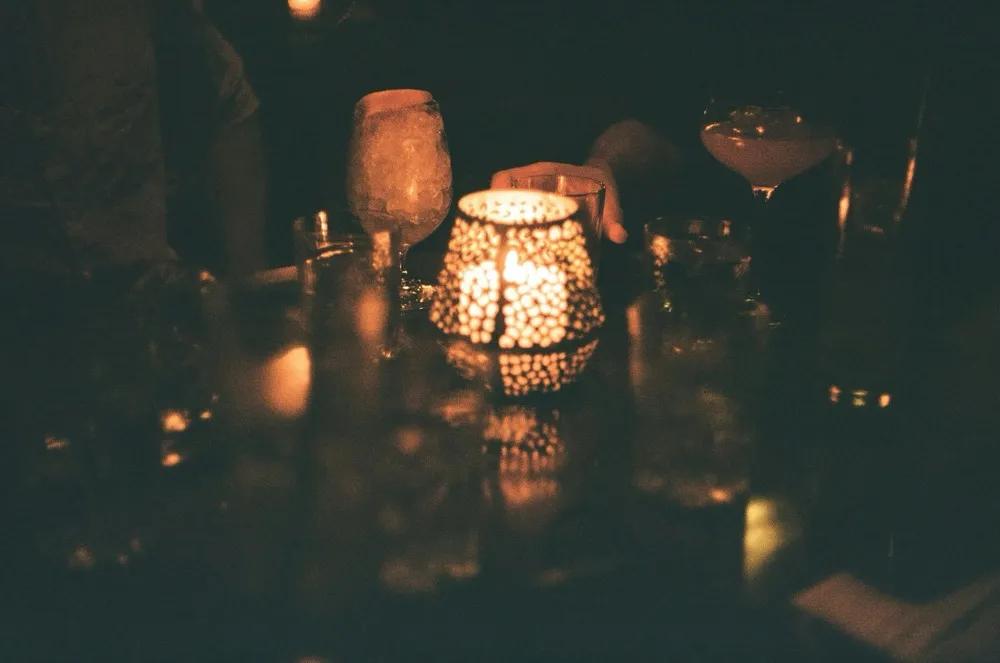 Ornate candle lantern with amber glow